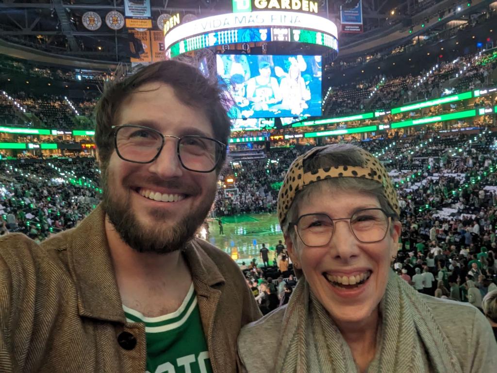 a man and a women at a basketball game