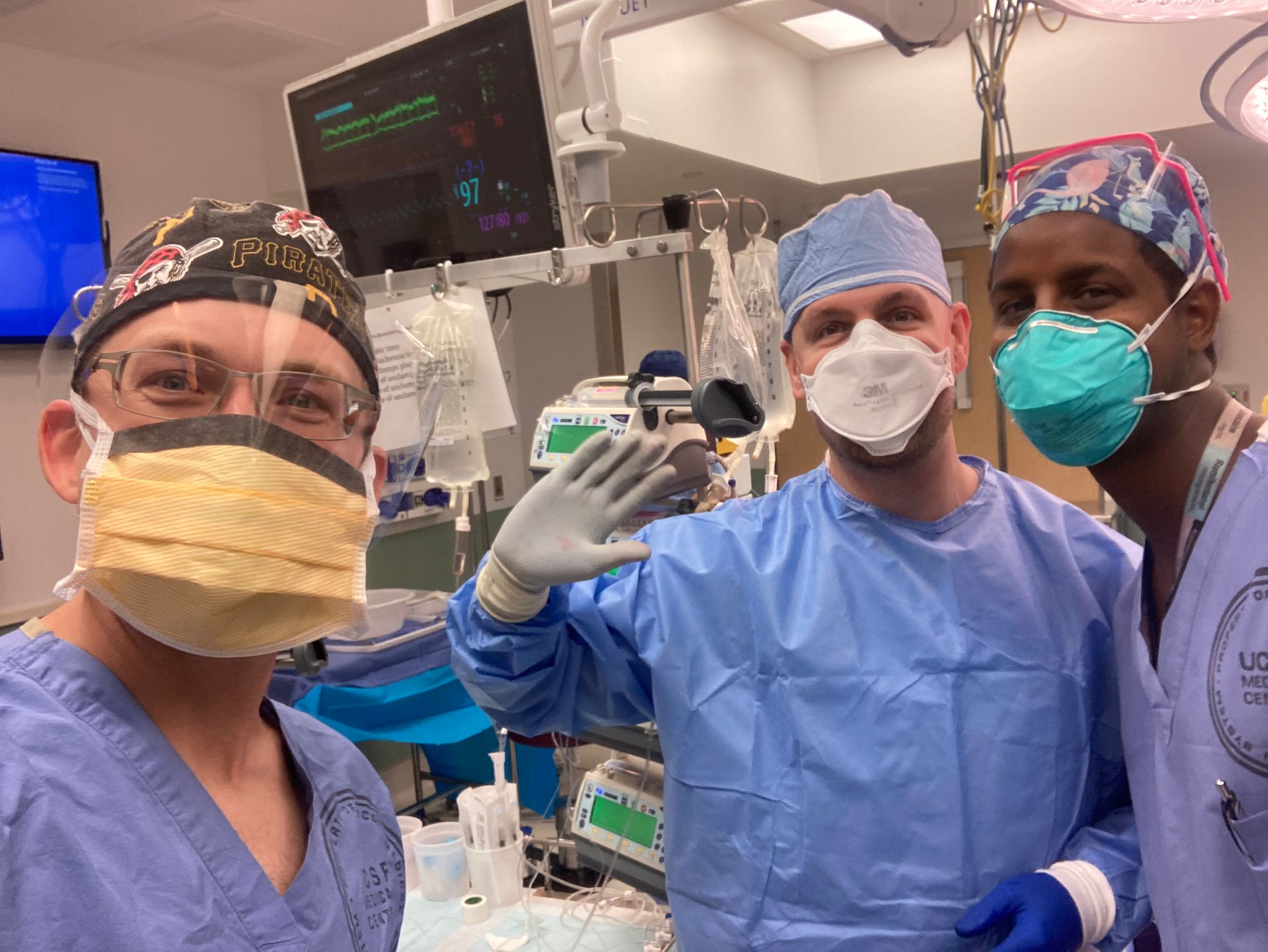 Doctors wearing masks in an operating room