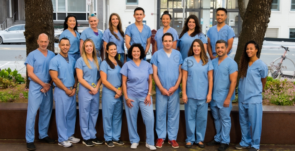 Group of CRNAs in blue scrubs.