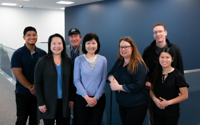 group of people in an office building.