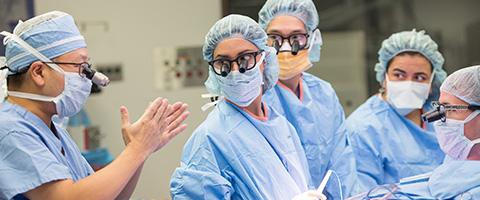 Healthcare providers in the communicating in the operating room