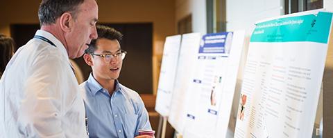 Anesthesia and Perioperative Care Department Chair Michael Gropper speaks with Paul Su at Anesthesia Research Day
