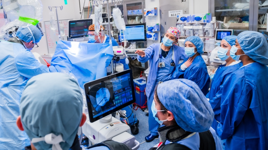 doctor showing students the OR.