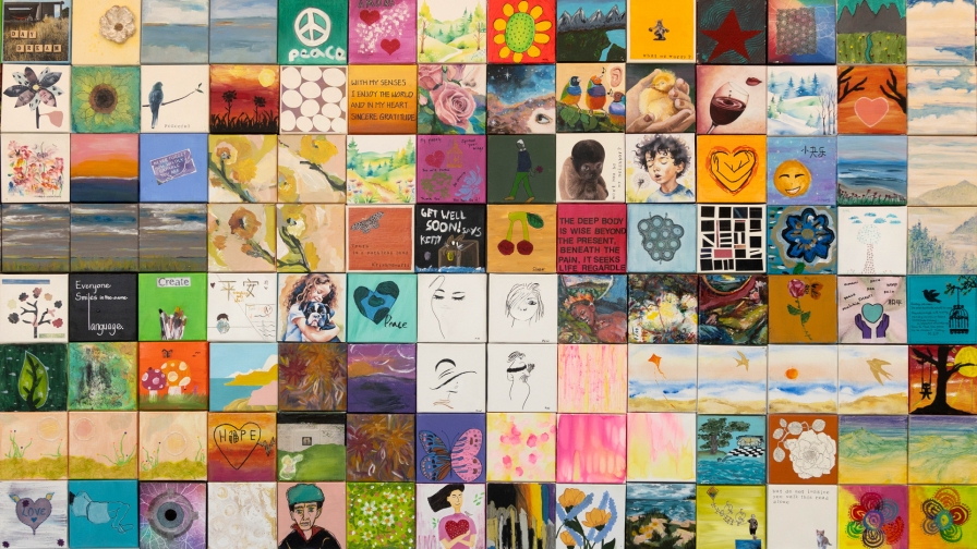 Grid of dozens of small square multi-colored artworks.