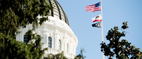 Sacramento Capital Building spire and flags