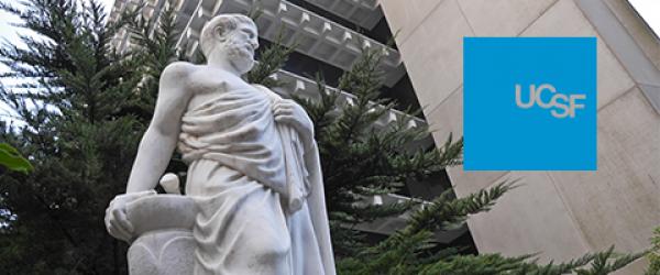 Statue of Hippocrates on the UCSF Parnassus campus, with UCSF blue logobox