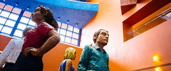 Statues of people in the William J. Rutter Center at UCSF Mission Bay