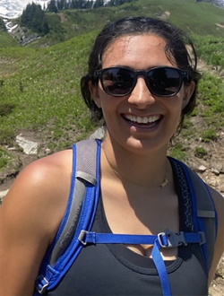 Women on a hike wearing wearing sunglasses