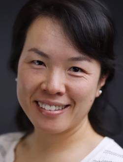 Smiling woman with short black hair