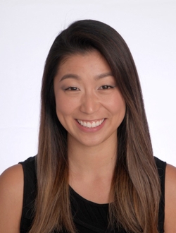 Smiling woman with long dark brown hair