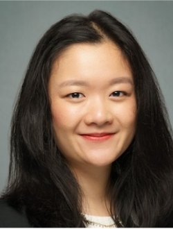 Woman with long black hair.