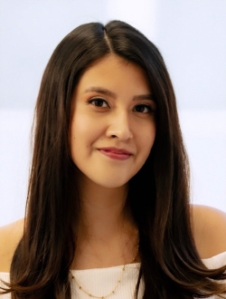 Woman with long dark brown hair.