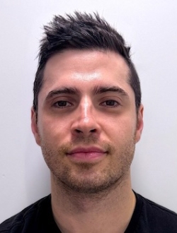Person with short dark spiky hair.