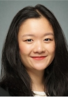 Woman with long black hair.