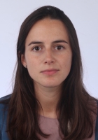 Woman with long brown hair.