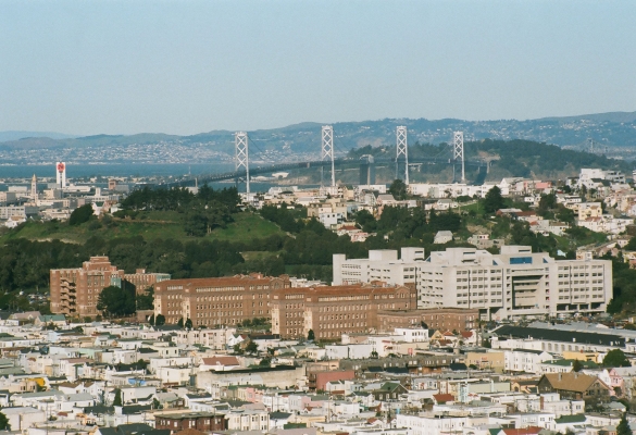 Aerial view of SFGH and the SF Bay Bridge circa late 1970s.