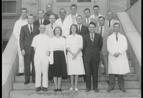 UCSF Anesthesia department members standing in a group on the steps of a building on the UCSF Parnassus Campus, 1959