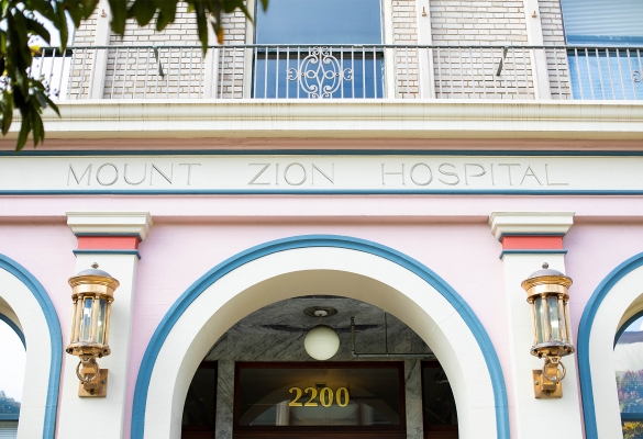Restored signage on the Esther Hellman Building, the first Mount Zion Hospital which was built from the ground up in 1911.
